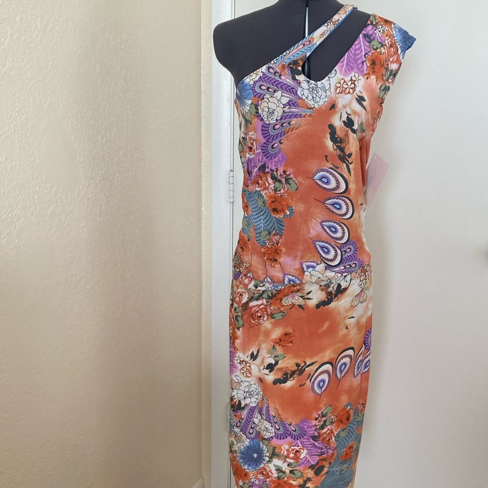 Amber Glo designs 2 pc. Skirt set. Sz S. NWT. Floral printed